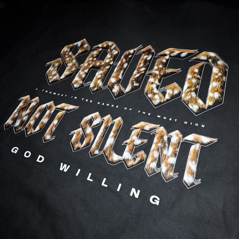 Close view of a photoreal fur-texture print on a black tee