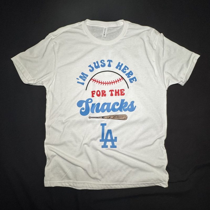 White tee with a blue and red baseball design